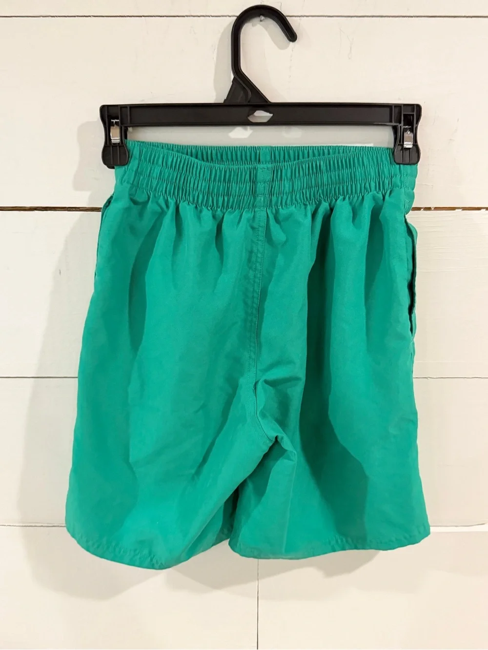 Nike Teal Green Kids Athletic Shorts with White Swoosh